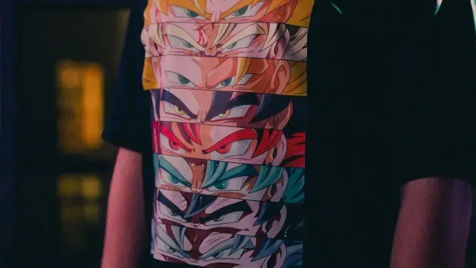 a man wearing a t - shirt with a colorful design on it